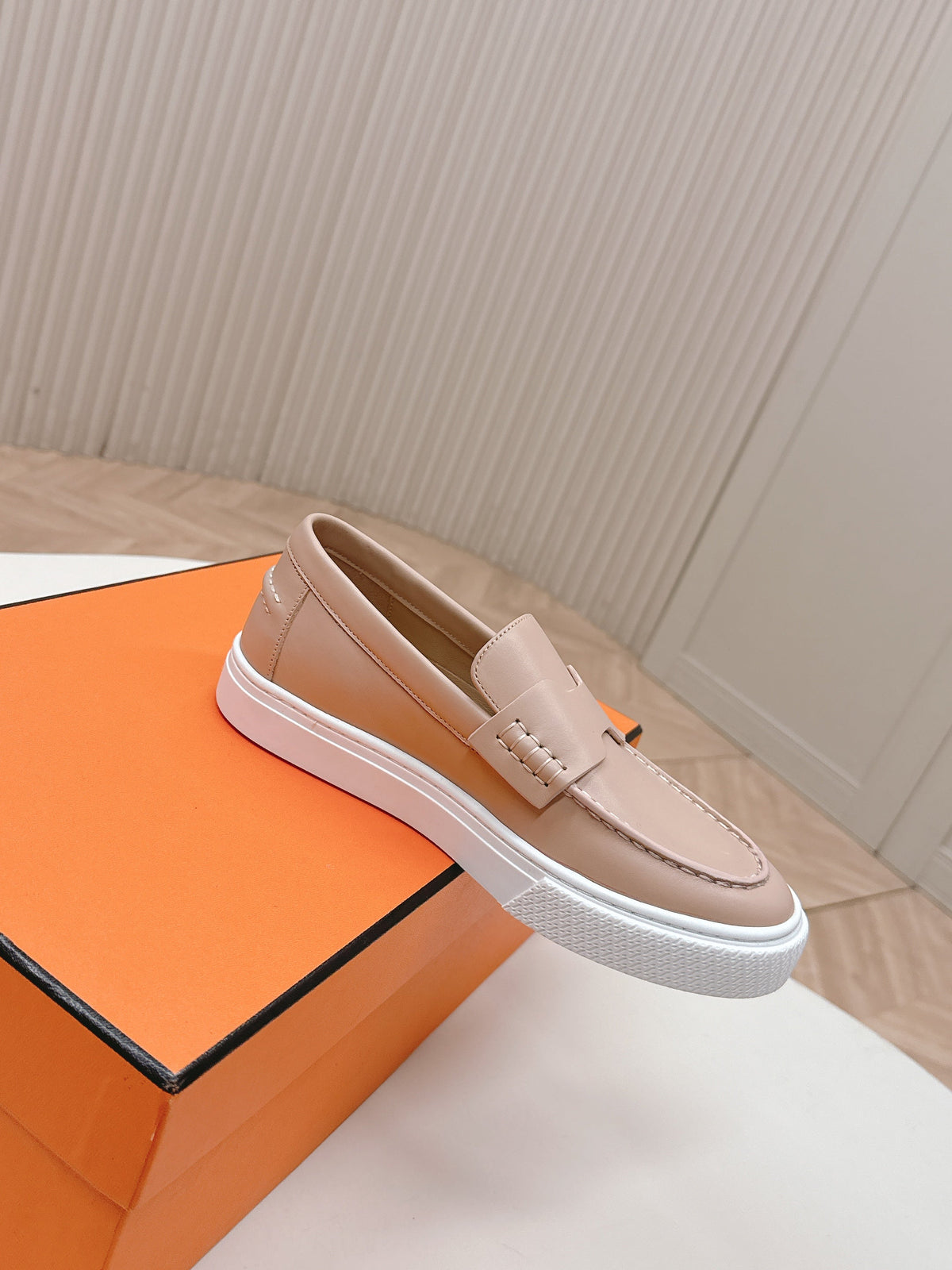 HERMES 25S SLIP-ON IN SOFT NUDE PINK LAMBSKIN